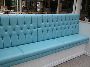 An image of deep buttoned seating.
