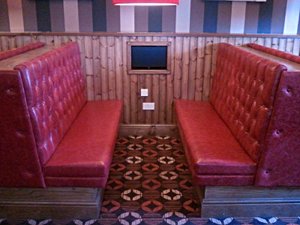 An image of deep buttoned seating.