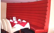 An image of red horizontal rolled fixed seating